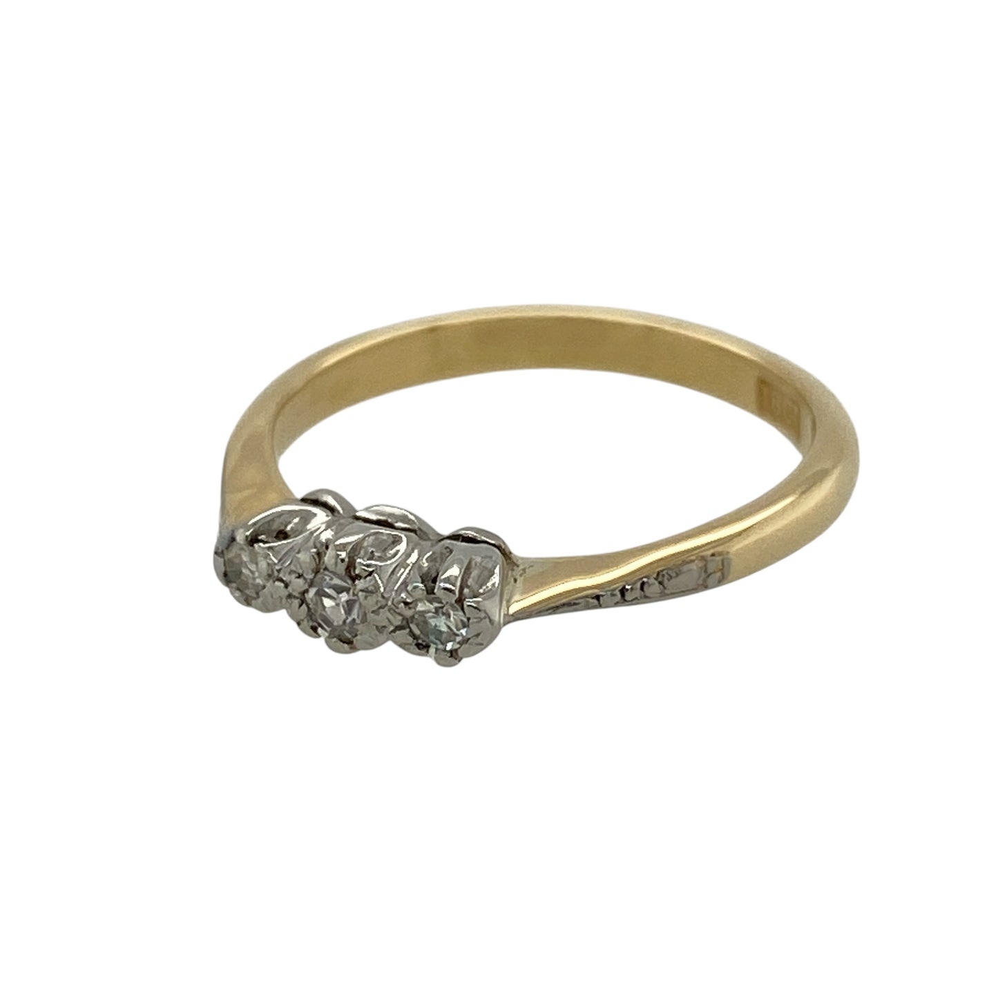 Celebrate timeless elegance and meaningful symbolism with this pre-owned 18ct yellow gold diamond trilogy ring, featuring three sparkling diamonds in a classic and sophisticated design.

Design: The ring showcases a traditional trilogy setting, with three diamonds arranged across the centre to symbolise the past, present and future. Its elegant proportions and timeless styling make it an ideal choice for everyday wear, anniversaries or marking life's special milestones.