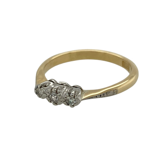 Celebrate timeless elegance and meaningful symbolism with this pre-owned 18ct yellow gold diamond trilogy ring, featuring three sparkling diamonds in a classic and sophisticated design.

Design: The ring showcases a traditional trilogy setting, with three diamonds arranged across the centre to symbolise the past, present and future. Its elegant proportions and timeless styling make it an ideal choice for everyday wear, anniversaries or marking life's special milestones.