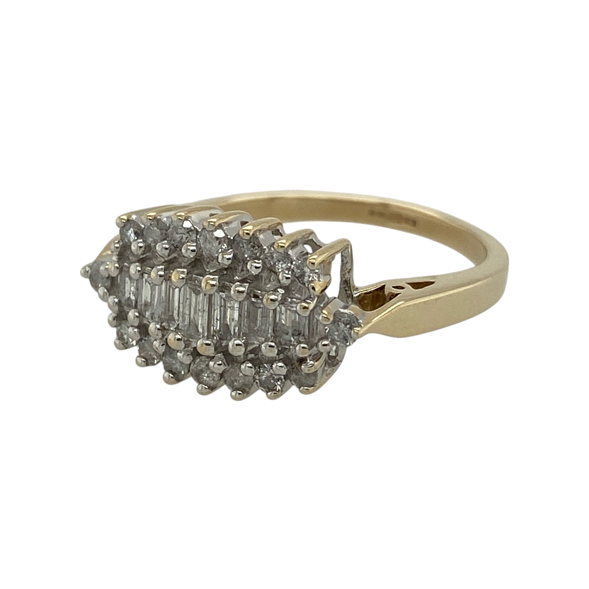 Celebrate timeless elegance with this pre-owned 9ct yellow gold diamond cluster ring, featuring a striking combination of baguette and brilliant-cut diamonds in a bold, eye-catching design.

Design: The ring showcases an impressive cluster arrangement combining baguette and brilliant-cut diamonds to create a beautiful display of sparkle and dimension. Measuring approximately 10mm high across the front, the substantial cluster offers a striking presence while maintaining a classic and elegant appearance.