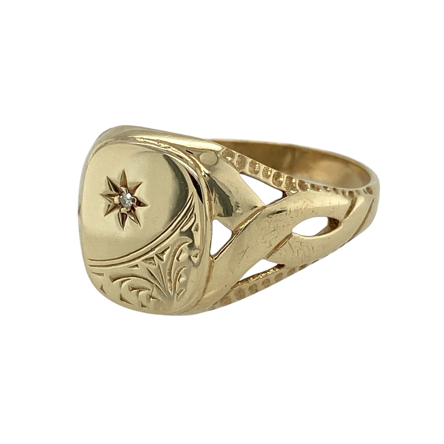 Add distinctive character and sparkling detail to your jewellery collection with this pre-owned 9ct yellow gold diamond patterned signet ring, featuring decorative styling and eye-catching open twist shoulders.

Design: The ring showcases a bold signet-style front enhanced with patterned detailing and diamond accents, creating a distinctive combination of traditional styling and decorative sparkle. Measuring approximately 13mm high across the front, the ring offers an impressive presence on the finger.