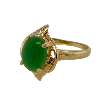 Add rich colour and timeless elegance to your fine jewellery collection with this pre-owned 18ct yellow gold diamond and jade dress ring, featuring a striking oval jade centre stone enhanced with sparkling diamond detailing.

Design: The ring showcases an elegant dress ring design centred around a beautiful oval jade stone measuring approximately 9mm by 7mm.