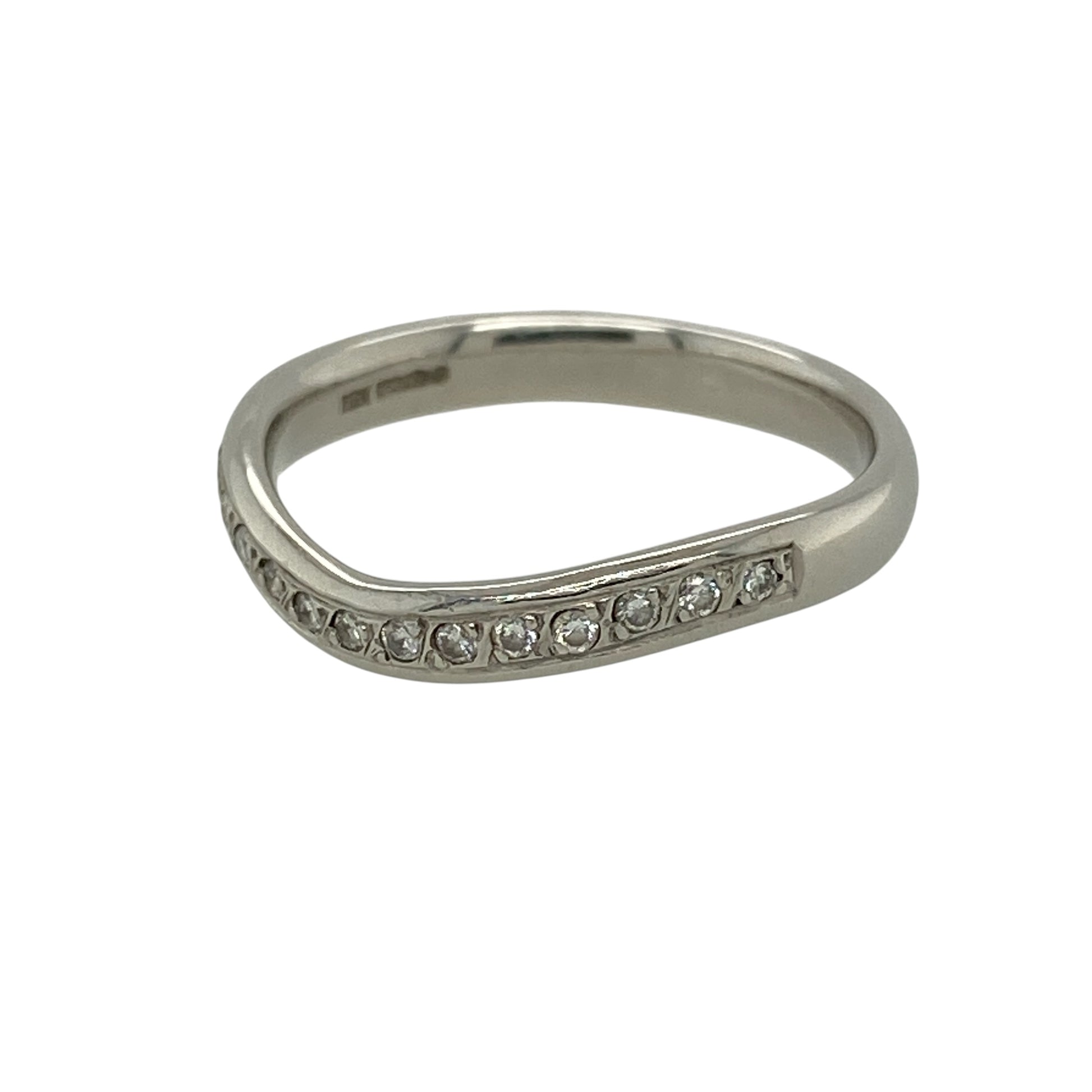 Add refined sparkle and timeless elegance to your fine jewellery collection with this pre-owned platinum diamond curved wishbone band ring, featuring a graceful profile designed to complement a variety of jewellery styles.

Design: The ring showcases an elegant curved wishbone design, creating a distinctive silhouette with a refined and versatile appearance.