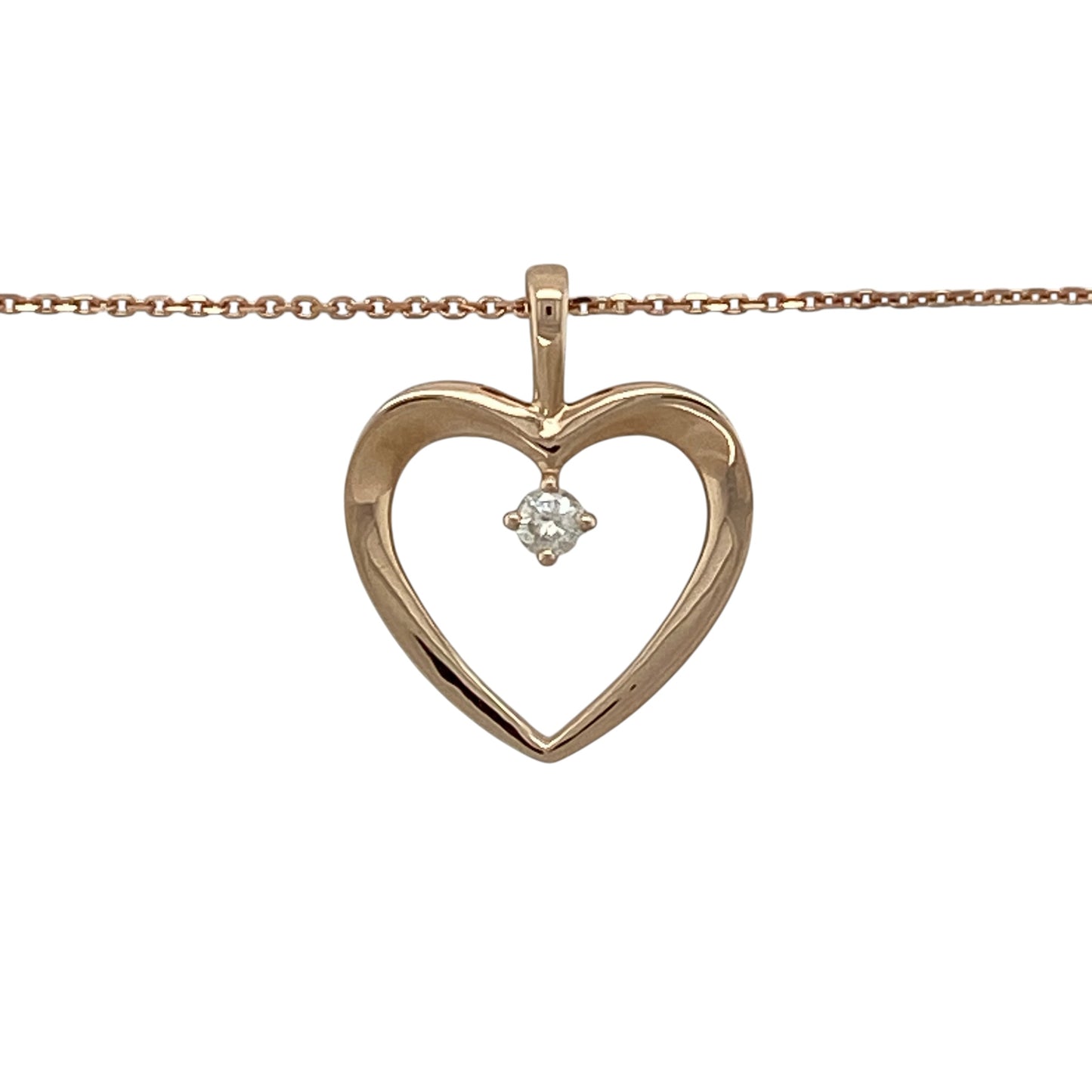 Celebrate romantic styling and delicate sparkle with this pre-owned 9ct rose gold diamond open heart pendant necklace, complete with a fine 16-inch belcher chain.

Design: The necklace showcases an elegant open heart pendant, creating a timeless symbol of love and affection with a light and graceful appearance. Sparkling diamond detailing enhances the romantic design, adding subtle brilliance and an attractive focal point when worn.