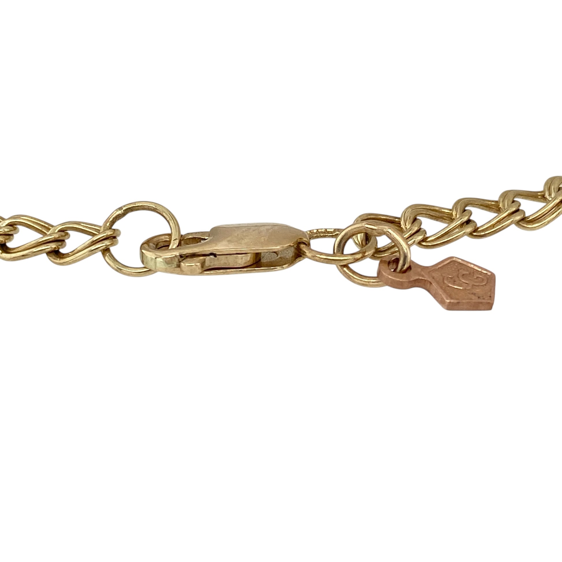 Add timeless two-tone styling and versatile charm bracelet appeal to your jewellery collection with this pre-owned 9ct yellow and rose gold Clogau 7-inch double curb charm bracelet.

Design: The bracelet showcases a classic double curb link design, creating an attractive combination of strength, flexibility and timeless styling. The 4mm wide links provide a noticeable presence on the wrist while retaining an elegant and wearable profile suitable for everyday wear.