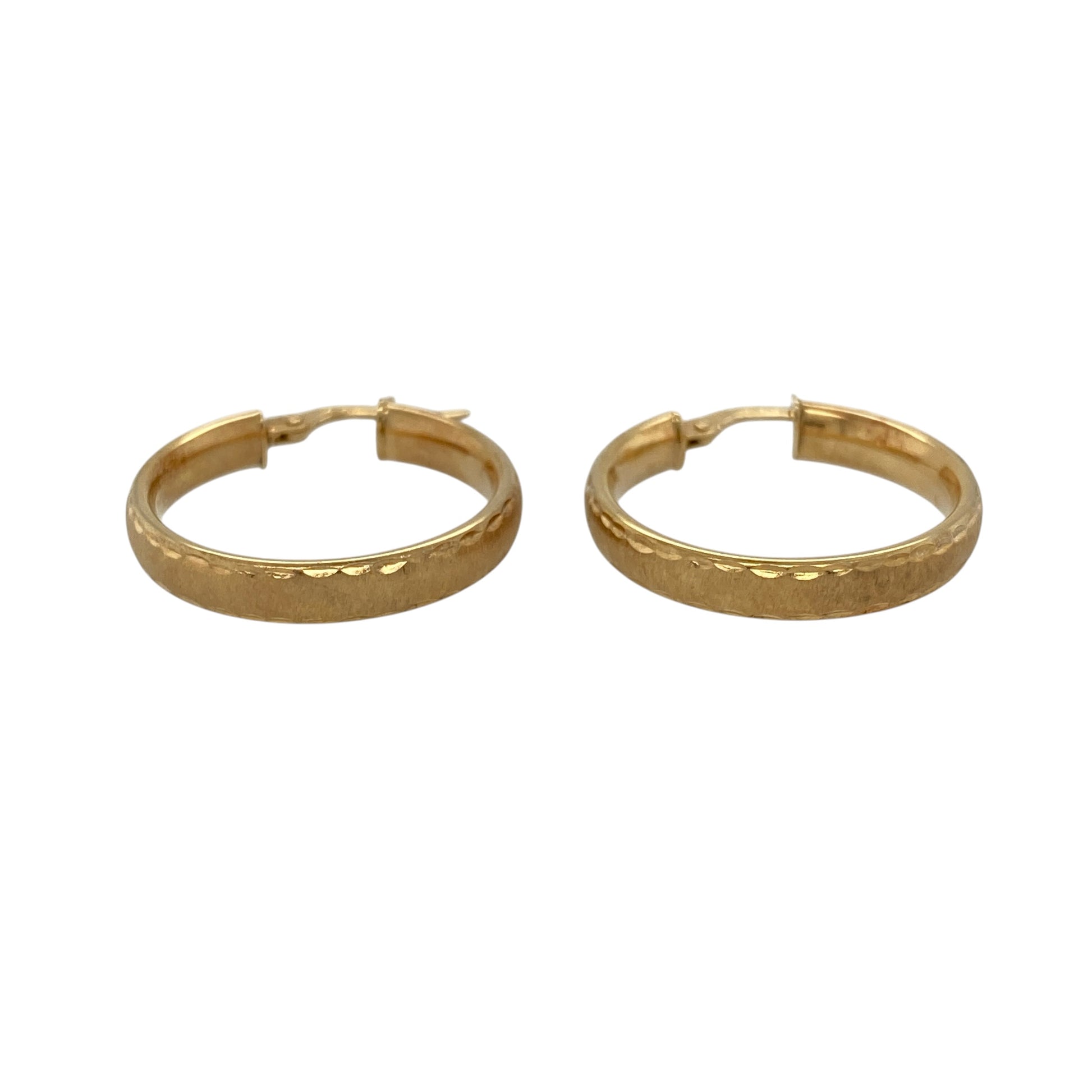 Add understated elegance and attractive texture to your jewellery collection with these pre-owned 9ct yellow gold patterned brushed-effect hoop creole earrings, featuring a timeless design with a distinctive decorative finish.

Design: The earrings showcase a classic hoop creole profile enhanced with patterned detailing and a brushed-effect finish.