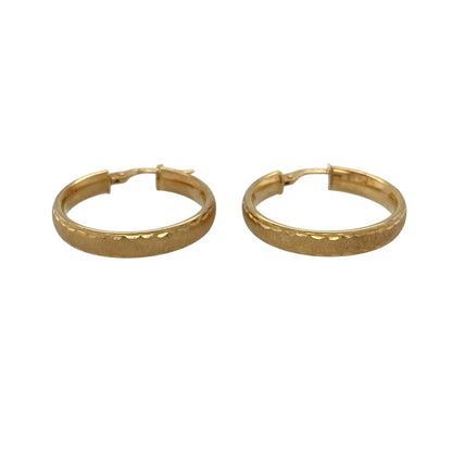 Add understated elegance and attractive texture to your jewellery collection with these pre-owned 9ct yellow gold patterned brushed-effect hoop creole earrings, featuring a timeless design with a distinctive decorative finish.

Design: The earrings showcase a classic hoop creole profile enhanced with patterned detailing and a brushed-effect finish.