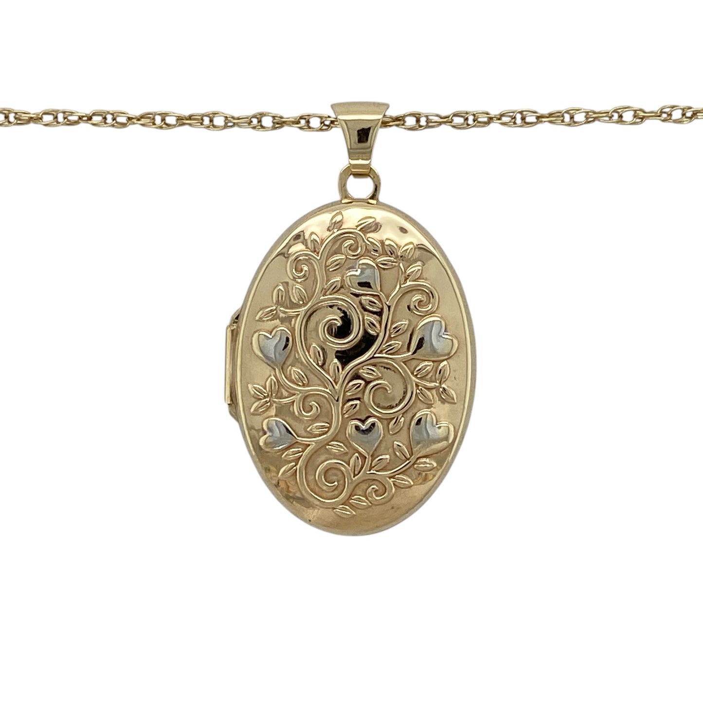 Add sentimental charm and elegant two-tone styling to your jewellery collection with this pre-owned 9ct yellow and white gold heart tree-style patterned oval locket necklace, complete with a 24-inch Prince of Wales chain.

Design: The necklace showcases an elegant oval locket enhanced with decorative heart and tree-inspired patterning, creating a meaningful and eye-catching appearance.