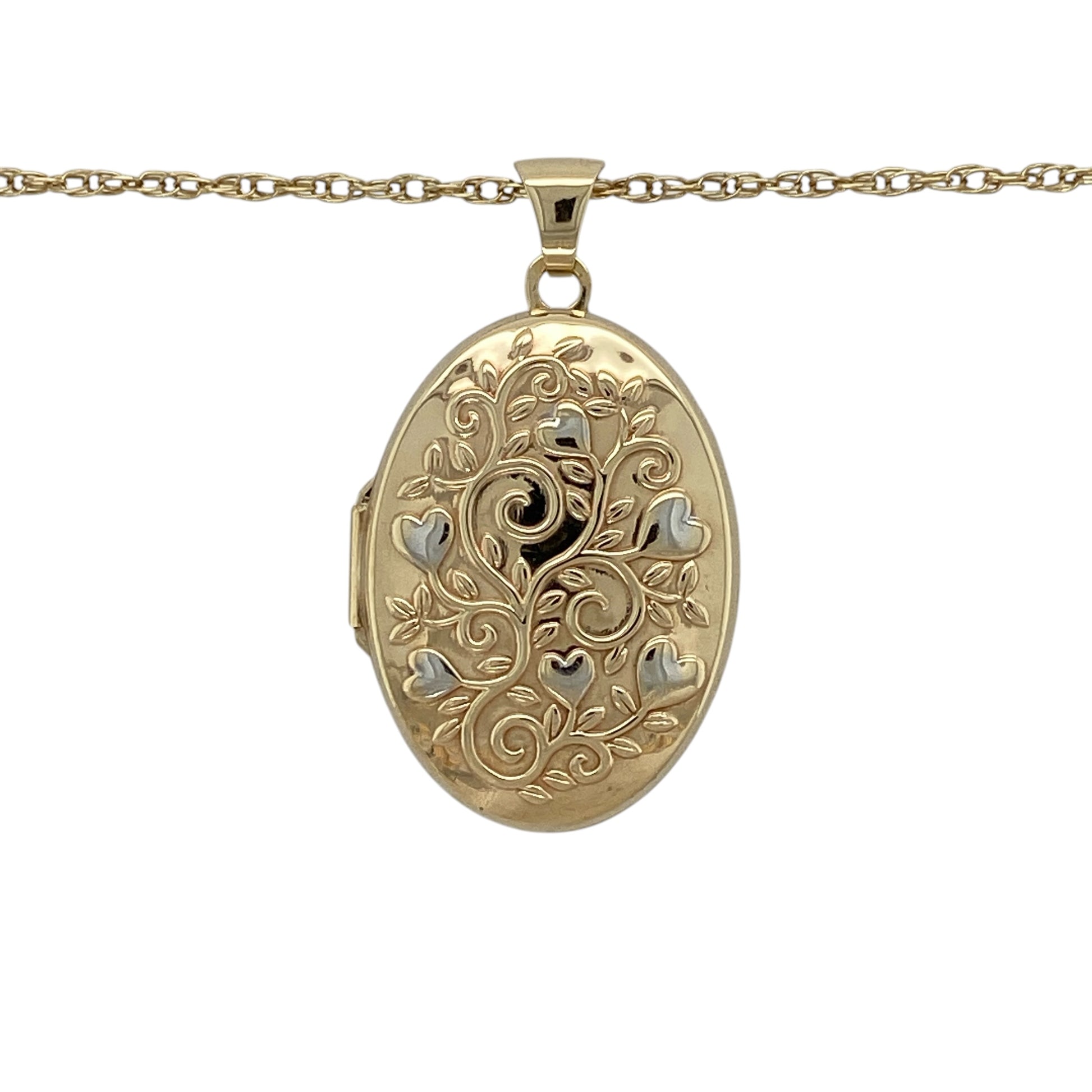 Add sentimental charm and elegant two-tone styling to your jewellery collection with this pre-owned 9ct yellow and white gold heart tree-style patterned oval locket necklace, complete with a 24-inch Prince of Wales chain.

Design: The necklace showcases an elegant oval locket enhanced with decorative heart and tree-inspired patterning, creating a meaningful and eye-catching appearance.