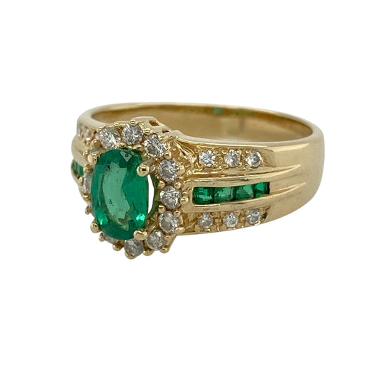 Add rich colour and timeless elegance to your fine jewellery collection with this pre-owned 14ct yellow gold diamond and emerald cluster ring, featuring a striking oval emerald centre stone with additional emerald and diamond detailing on the shoulders.

Design: The ring showcases an elegant cluster-style design centred around a vibrant oval emerald.