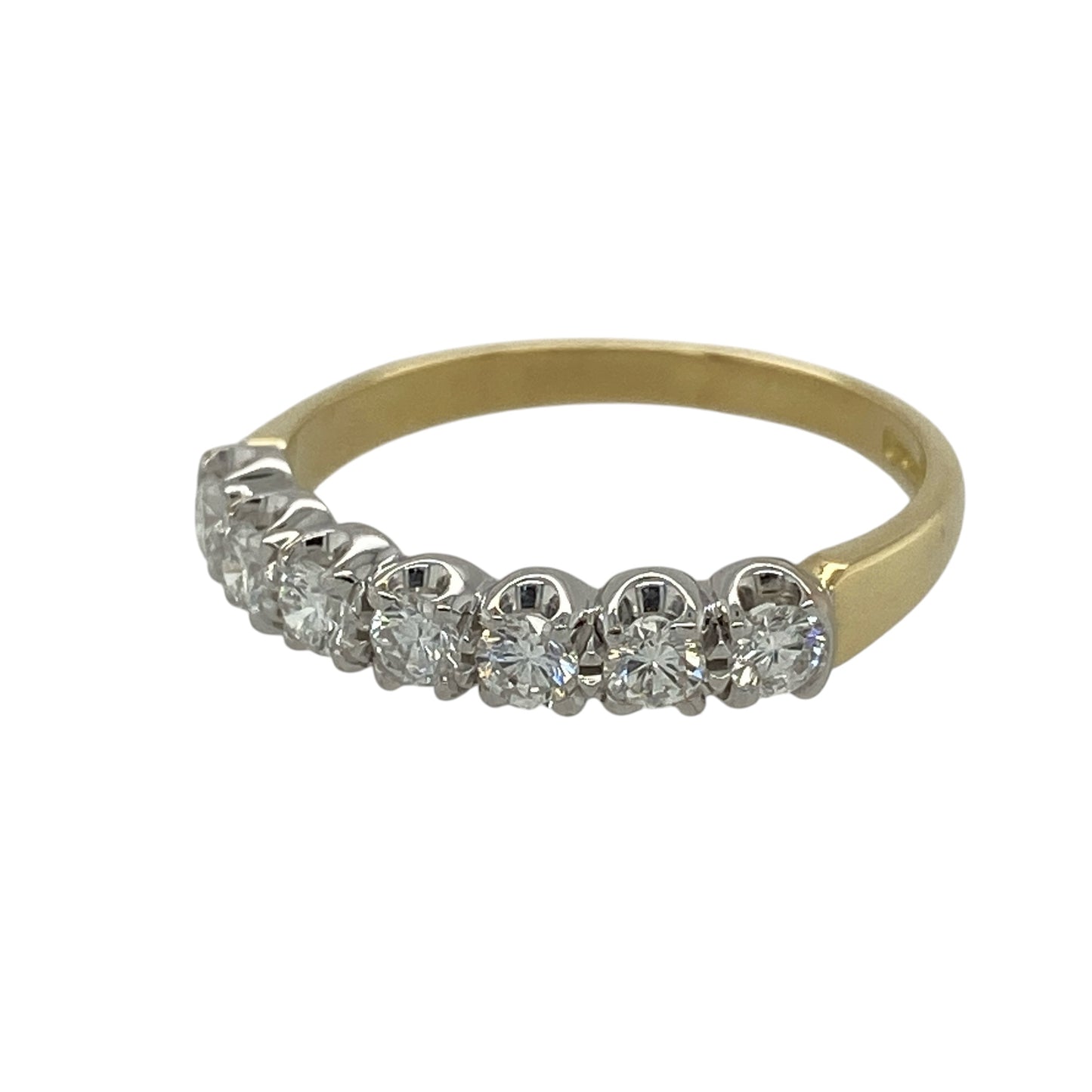 Add timeless elegance and sparkling brilliance to your fine jewellery collection with this pre-owned 18ct yellow gold diamond seven stone band ring, featuring a classic arrangement of brilliant cut diamonds.

Design: The ring showcases an elegant seven stone band design, with brilliant cut diamonds arranged across the front of the ring to create a balanced and sophisticated appearance.