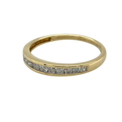 Add timeless elegance and refined sparkle to your fine jewellery collection with this pre-owned 18ct yellow gold diamond band ring, featuring approximately 0.25ct of diamond content in a classic and versatile design.

Design: The ring showcases an elegant diamond-set band design with a front width of approximately 3mm. The sparkling diamond detailing creates a refined appearance across the finger, making the ring suitable for everyday elegance, special occasions or wearing alongside other compatible rings.