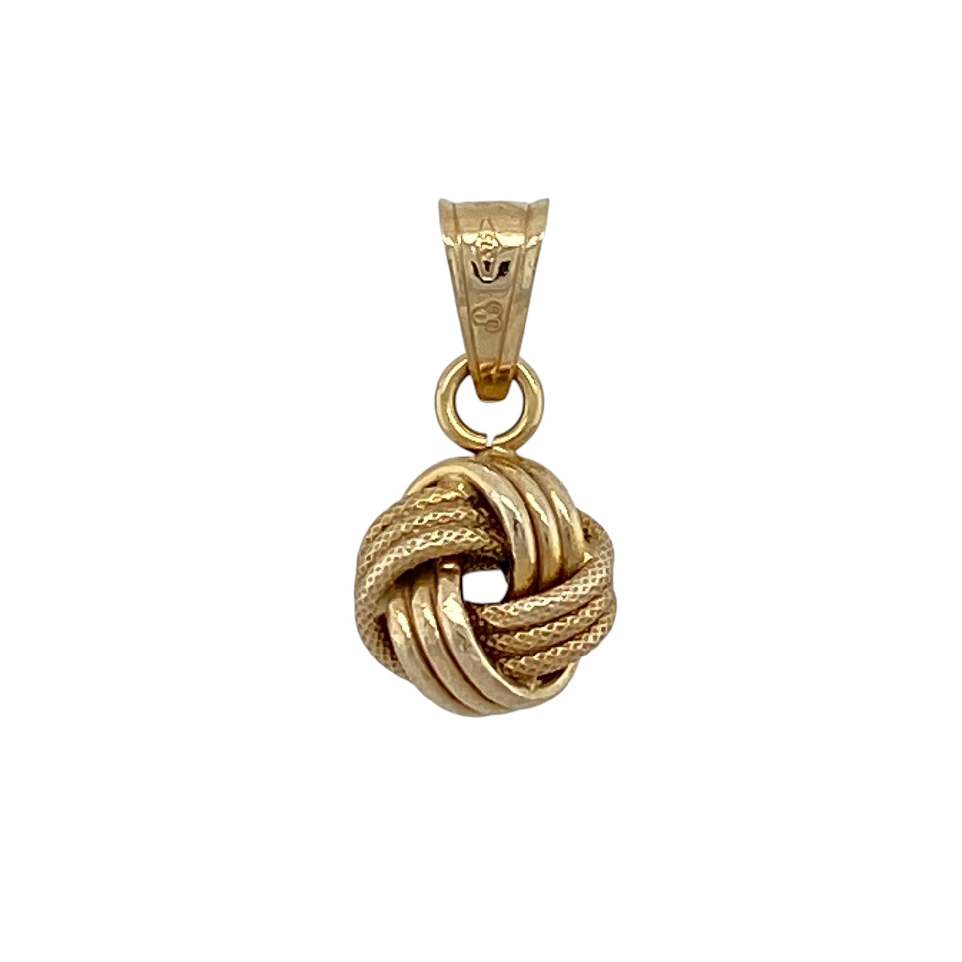 Add timeless elegance and classic decorative styling to your jewellery collection with this pre-owned 9ct yellow gold knot pendant, featuring an attractive intertwined design with a versatile profile.

Design: The pendant showcases a traditional knot motif formed from gracefully intertwined sections of yellow gold. The decorative design creates texture, depth and visual interest, giving the pendant a timeless appearance suitable for everyday wear or special occasions.