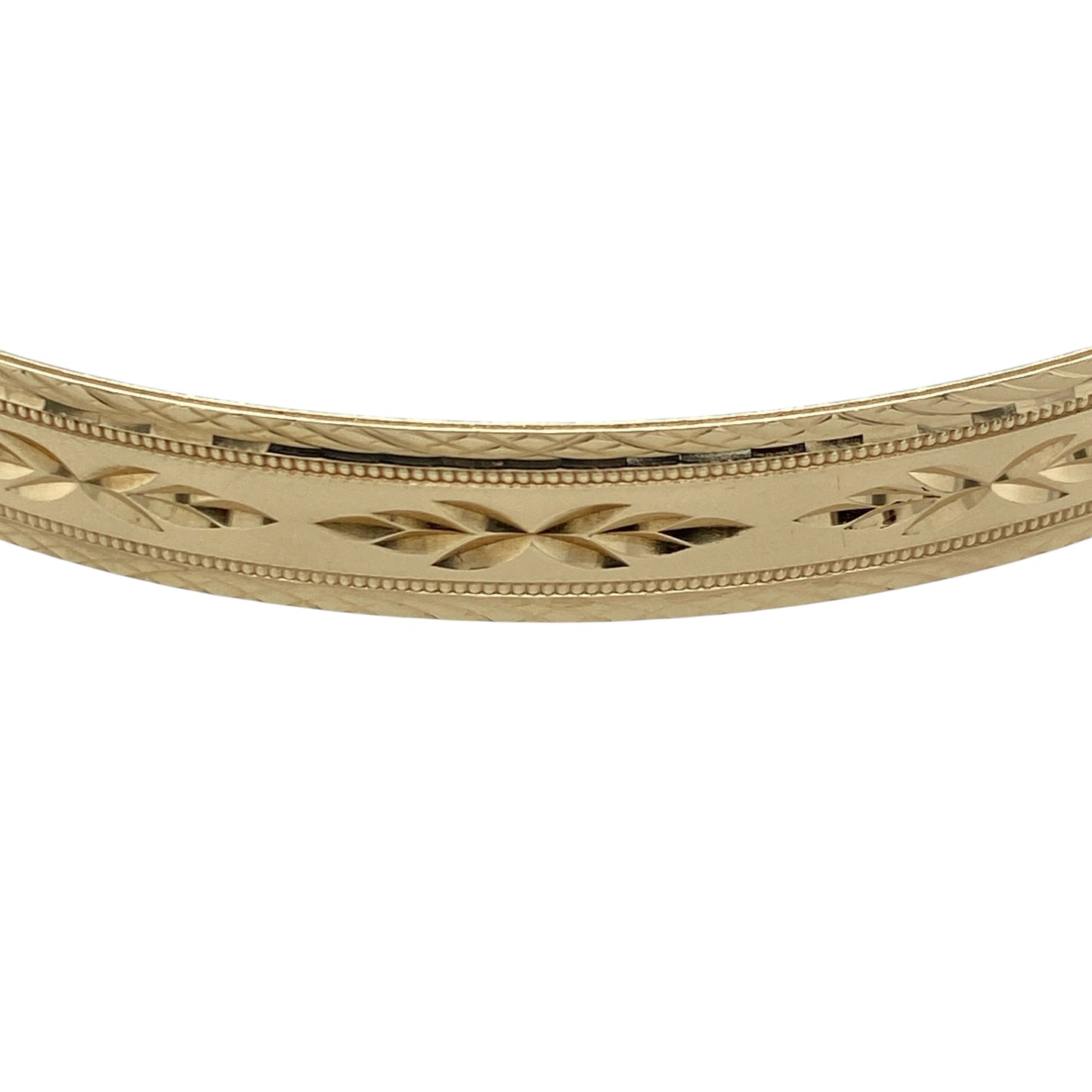 Add timeless elegance and distinctive decorative detail to your jewellery collection with this pre-owned 9ct yellow solid gold patterned bangle, featuring an attractive textured design with a substantial profile.

Design: The bangle showcases a classic profile enhanced with decorative patterning, creating texture, depth and visual interest while retaining a timeless and versatile appearance suitable for everyday wear or special occasions.
