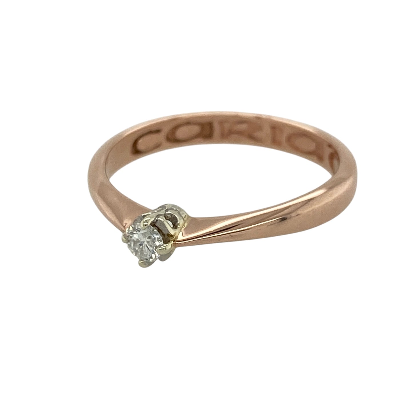 Celebrate timeless romance and elegant simplicity with this pre-owned 9ct rose gold and diamond Clogau Cariad solitaire ring. Featuring a sparkling brilliant-cut diamond and the distinctive Cariad design, this beautiful ring is perfect as a gift, promise ring, engagement ring, or a cherished addition to any jewellery collection.

Design: The ring features a single brilliant-cut diamond of approximately 0.12ct, presented in the iconic Clogau Cariad style.