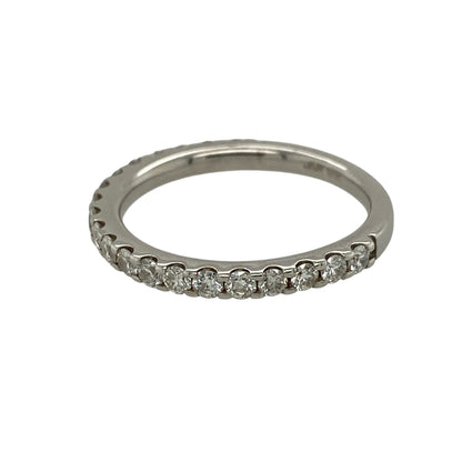 Add timeless elegance and refined sparkle to your jewellery collection with this pre-owned 18ct white gold and diamond half eternity band ring, featuring a classic design with substantial diamond content.

Design: The ring showcases a traditional half eternity design with diamonds set across the front section of the band, creating an elegant line of sparkle and a timeless appearance suitable for everyday wear or special occasions.