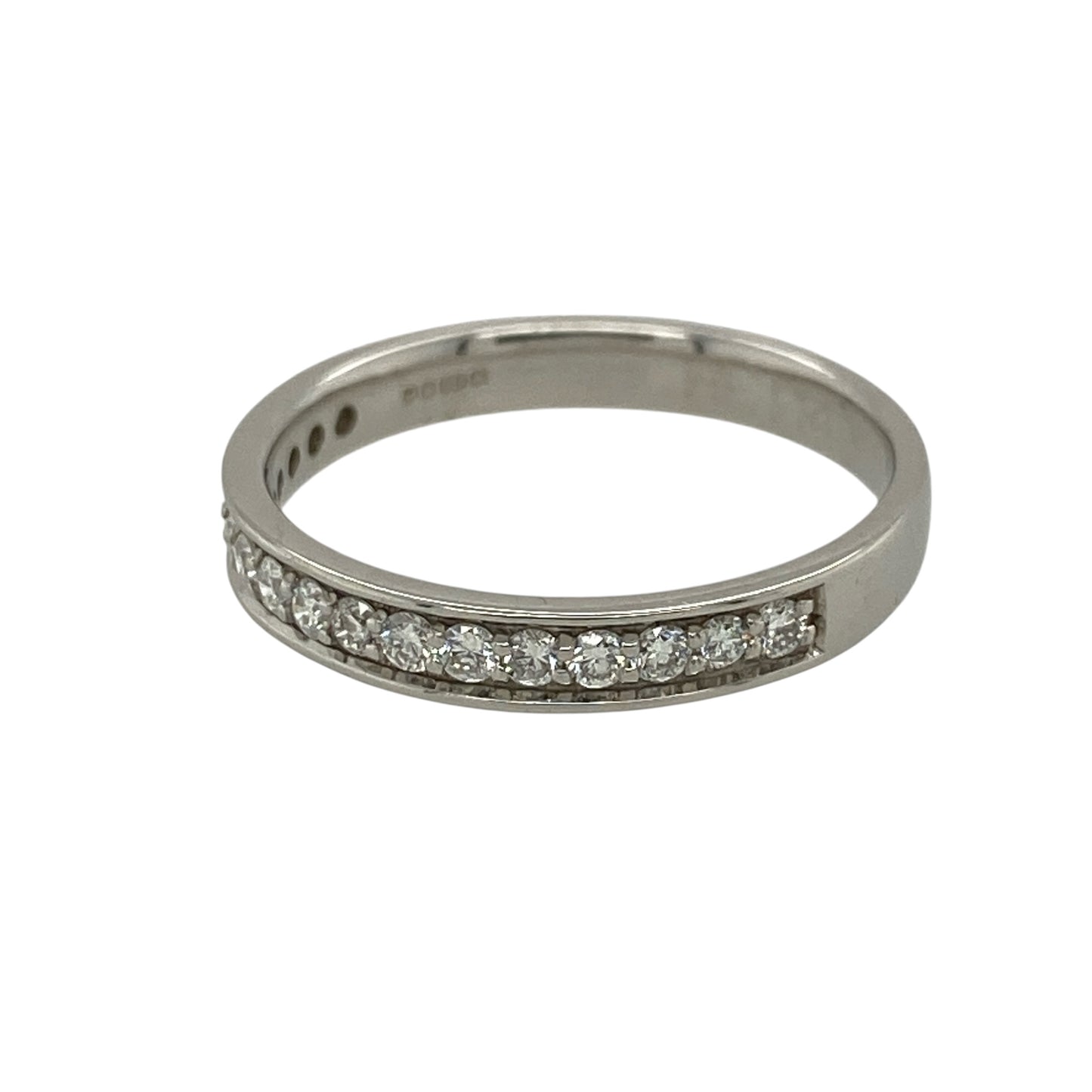 Add timeless elegance and refined sparkle to your jewellery collection with this pre-owned 18ct white gold and diamond half eternity style band ring, featuring a classic design set with seventeen brilliant cut diamonds.

Design: The ring showcases a traditional half eternity style design with a row of brilliant cut diamonds set across the front section of the band, creating an elegant line of sparkle and a timeless appearance suitable for everyday wear or special occasions.