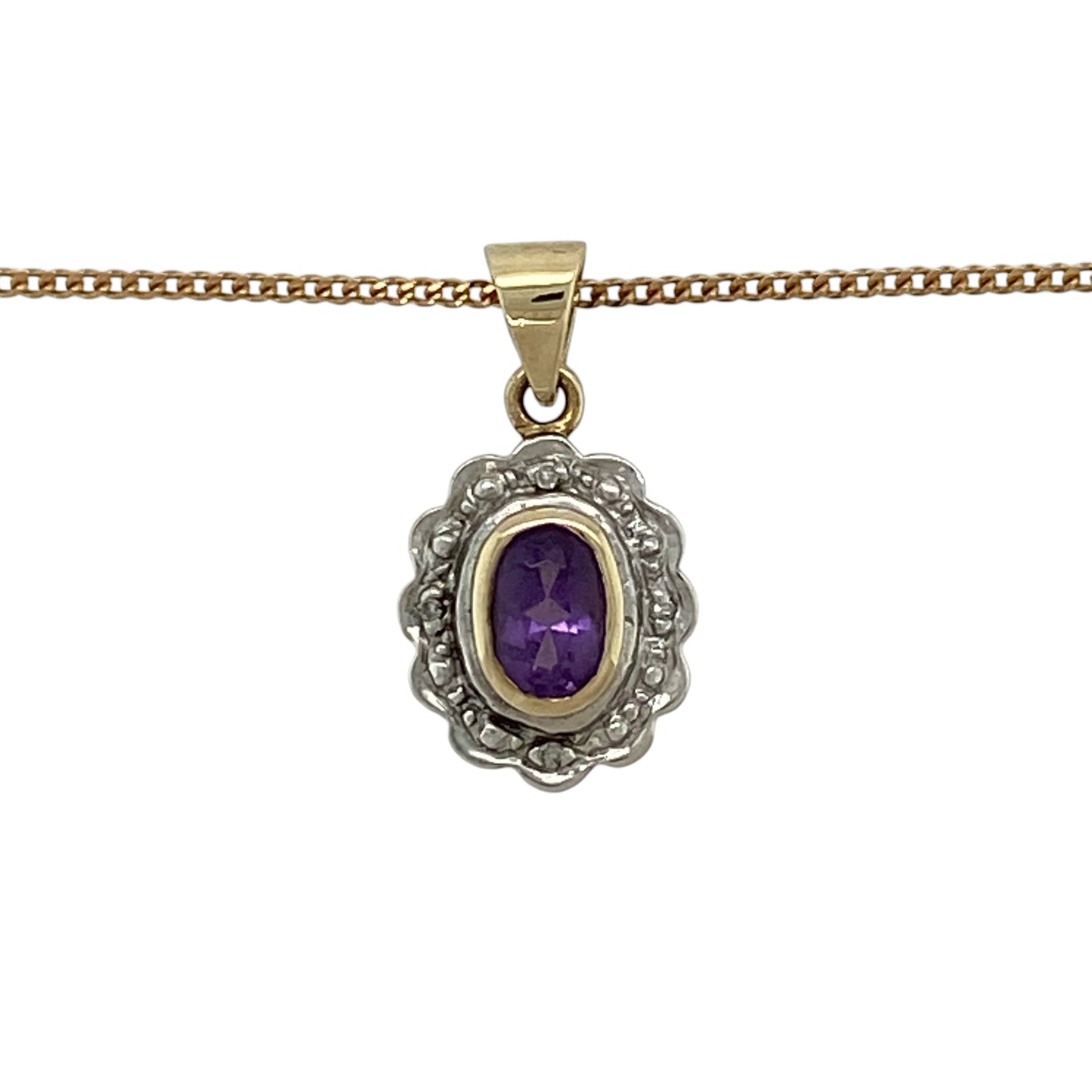 Add rich colour, refined sparkle and versatile two-tone styling to your jewellery collection with this pre-owned 9ct yellow and white gold diamond and amethyst cluster pendant necklace, featuring a classic gemstone design suspended from a 20-inch curb chain.

Design: The necklace showcases an elegant cluster pendant centred around an oval amethyst and complemented by diamond detailing, creating an attractive combination of rich colour and sparkle with a versatile two-tone appearance.