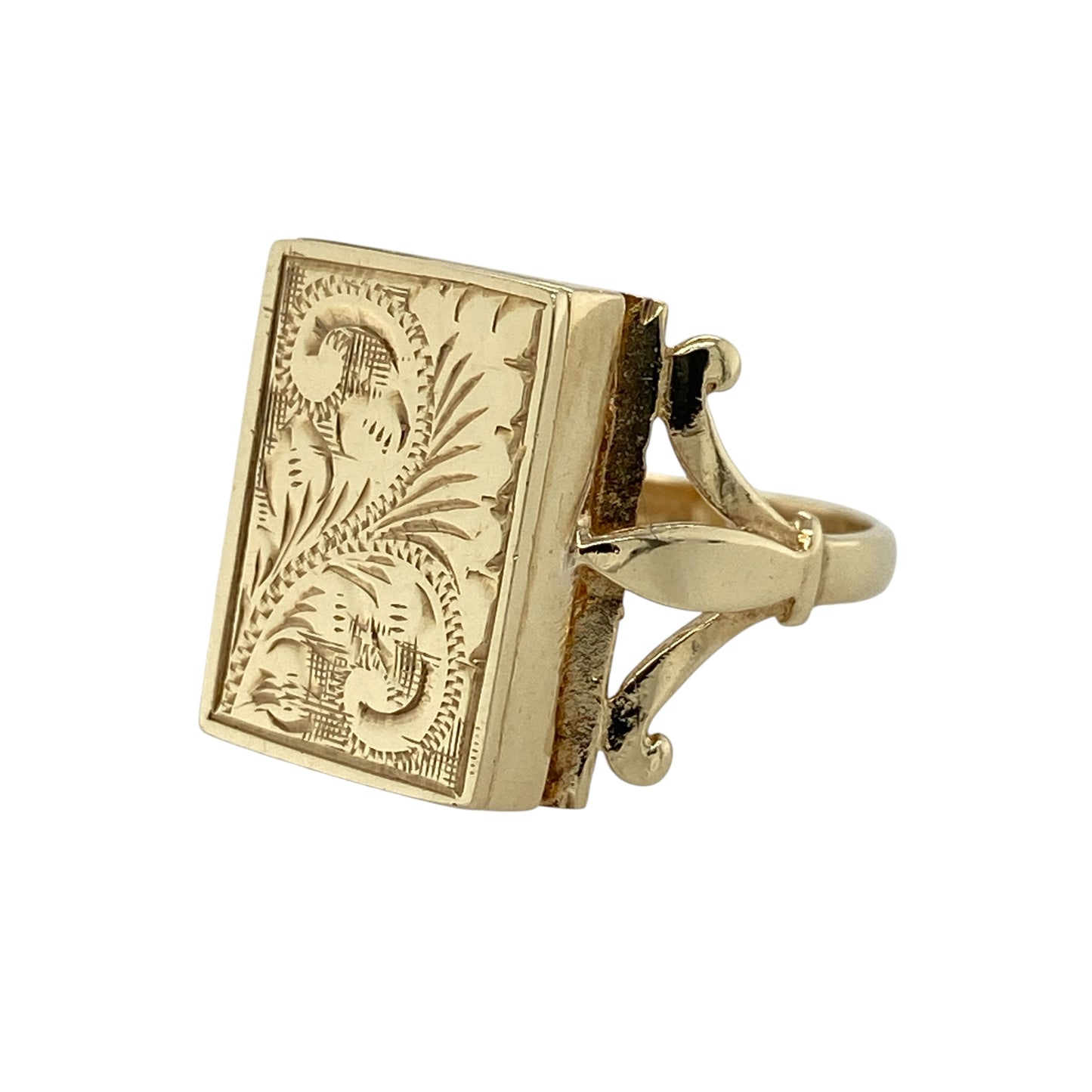 Add distinctive vintage-inspired character and practical hidden storage to your jewellery collection with this pre-owned 9ct yellow gold patterned rectangle locket ring, featuring an unusual statement design with decorative detailing.

Design: The ring showcases a distinctive rectangular locket-style front enhanced with decorative patterning, creating an eye-catching and characterful appearance with vintage-inspired appeal.