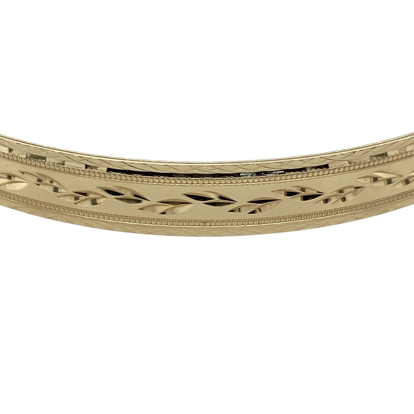 Add timeless elegance and decorative detail to your jewellery collection with this pre-owned 9ct yellow solid gold patterned bangle, featuring a substantial profile with an attractive textured finish.

Design: The bangle showcases a traditional round profile enhanced with decorative patterning, creating additional texture and visual interest while retaining the timeless appeal of classic gold jewellery.