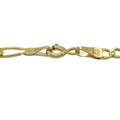 Add timeless styling and classic gold appeal to your jewellery collection with this pre-owned 9ct yellow gold Figaro bracelet, featuring a traditional link design with a lightweight and versatile profile.

Design: The bracelet showcases the classic Figaro link pattern, featuring alternating link sizes that create a distinctive and timeless appearance suitable for everyday wear or special occasions.