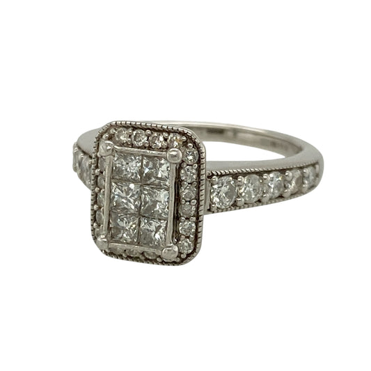 Add impressive sparkle and bold geometric styling to your jewellery collection with this pre-owned 9ct white gold and diamond rectangle cluster ring, featuring a substantial diamond-set design with an eye-catching presence.

Design: The ring showcases a striking rectangular cluster design set with multiple diamonds, creating a bold geometric appearance with impressive sparkle and visual impact.