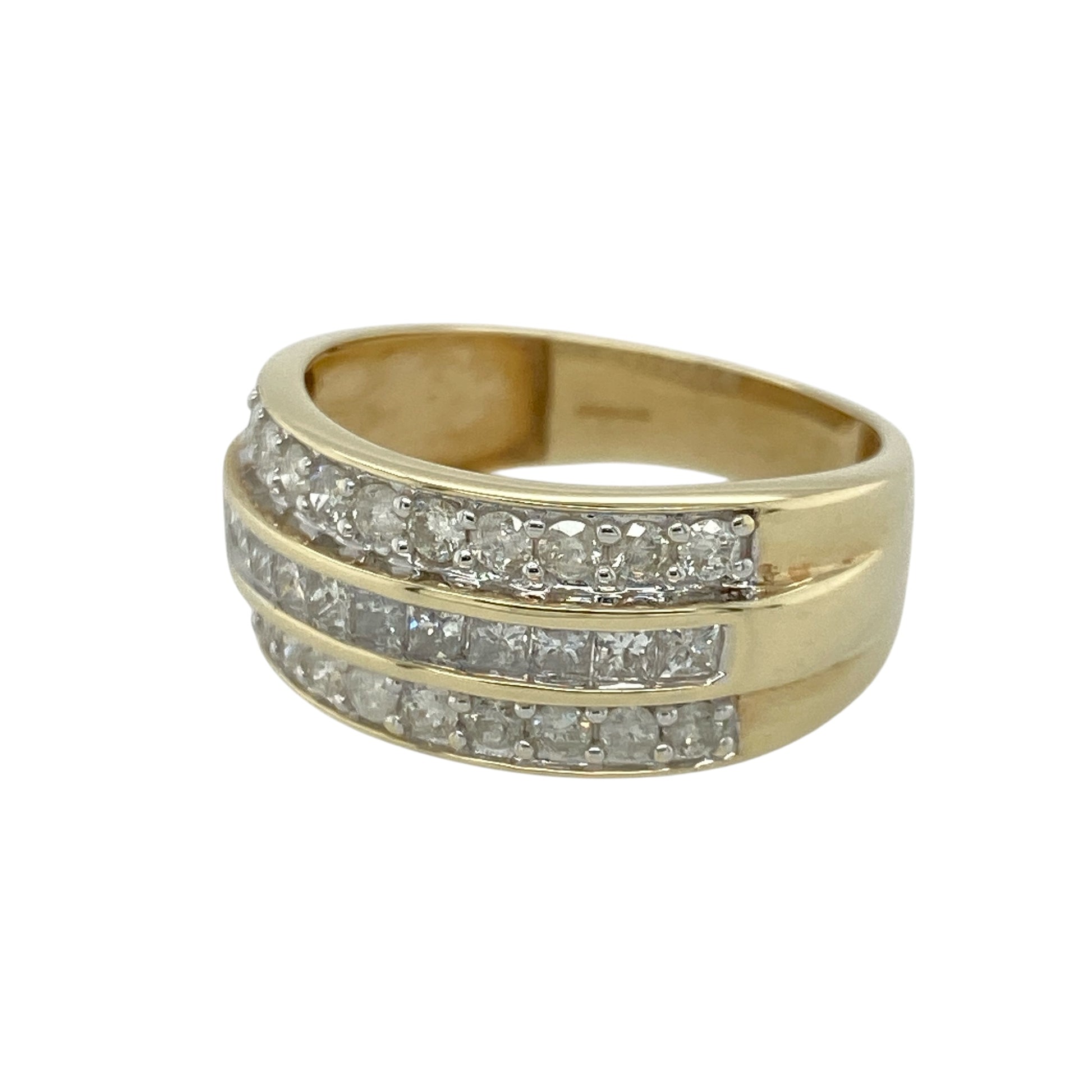 Add impressive sparkle and bold styling to your jewellery collection with this pre-owned 9ct yellow gold and diamond three row wide band ring, featuring a substantial diamond-set design with an eye-catching presence.

Design: The ring showcases a striking wide band profile with diamonds arranged across three rows, creating a bold and luxurious appearance with impressive sparkle and visual impact.
