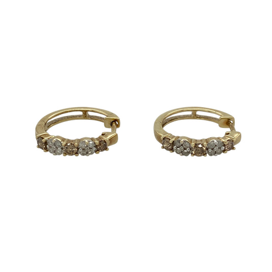 Add distinctive diamond colour and elegant sparkle to your jewellery collection with these pre-owned 9ct yellow gold chocolate and white diamond hoop earrings, featuring a striking combination of contrasting diamond tones.

Design: The earrings showcase a classic hoop profile enhanced with chocolate and white diamonds, creating an attractive contrast of warm colour and bright sparkle with a distinctive and elegant appearance.