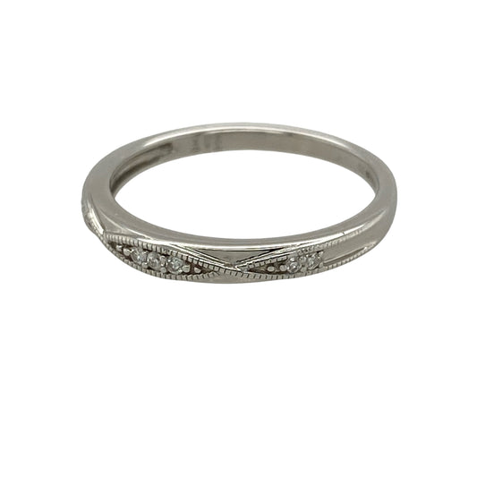 Add delicate sparkle and vintage-inspired elegance to your jewellery collection with this pre-owned 9ct white gold and diamond band ring, featuring milgrain detailing and a graceful twist pattern—perfect as a diamond wedding band, stacking ring, anniversary ring, or elegant everyday piece.

Design: The ring features a slim 2mm wide front with an elegant twist pattern, enhanced by fine milgrain detailing and sparkling diamond accents for a refined vintage-inspired appearance.