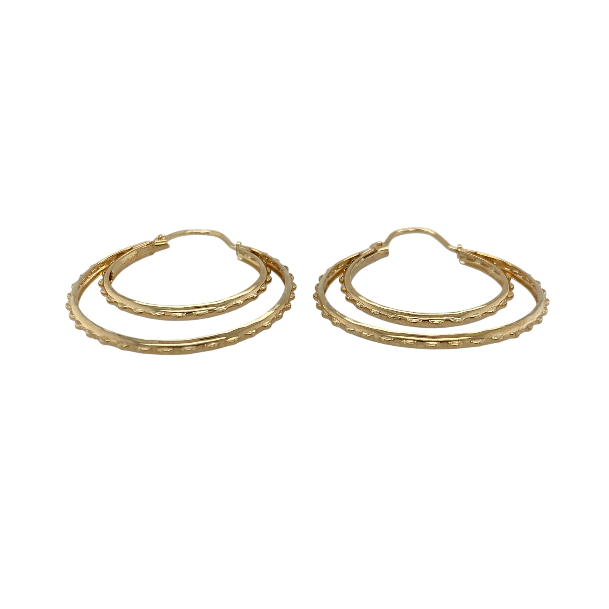 Add texture and timeless style to your jewellery collection with these pre-owned 9ct yellow gold textured double hoop Creole earrings, featuring a layered hoop design and decorative finish—perfect for everyday wear, special occasions, or adding a distinctive touch to any outfit.

Design: The earrings feature an eye-catching double hoop Creole design, combining two curved sections with textured detailing to create a stylish layered appearance.
