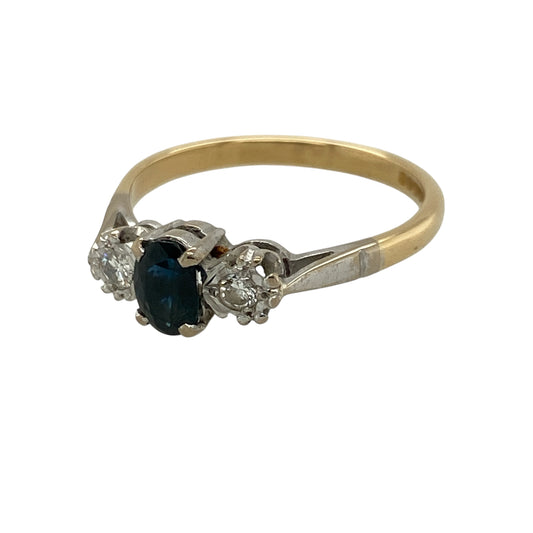 Add timeless colour and refined sparkle to your jewellery collection with this pre-owned 18ct yellow gold diamond and sapphire trilogy ring, featuring a classic oval sapphire flanked by two sparkling diamonds—perfect as an engagement ring, anniversary gift, romantic present, or elegant piece of fine jewellery.

Design: The ring features a traditional trilogy design centred with an oval sapphire and complemented by a diamond on either side
