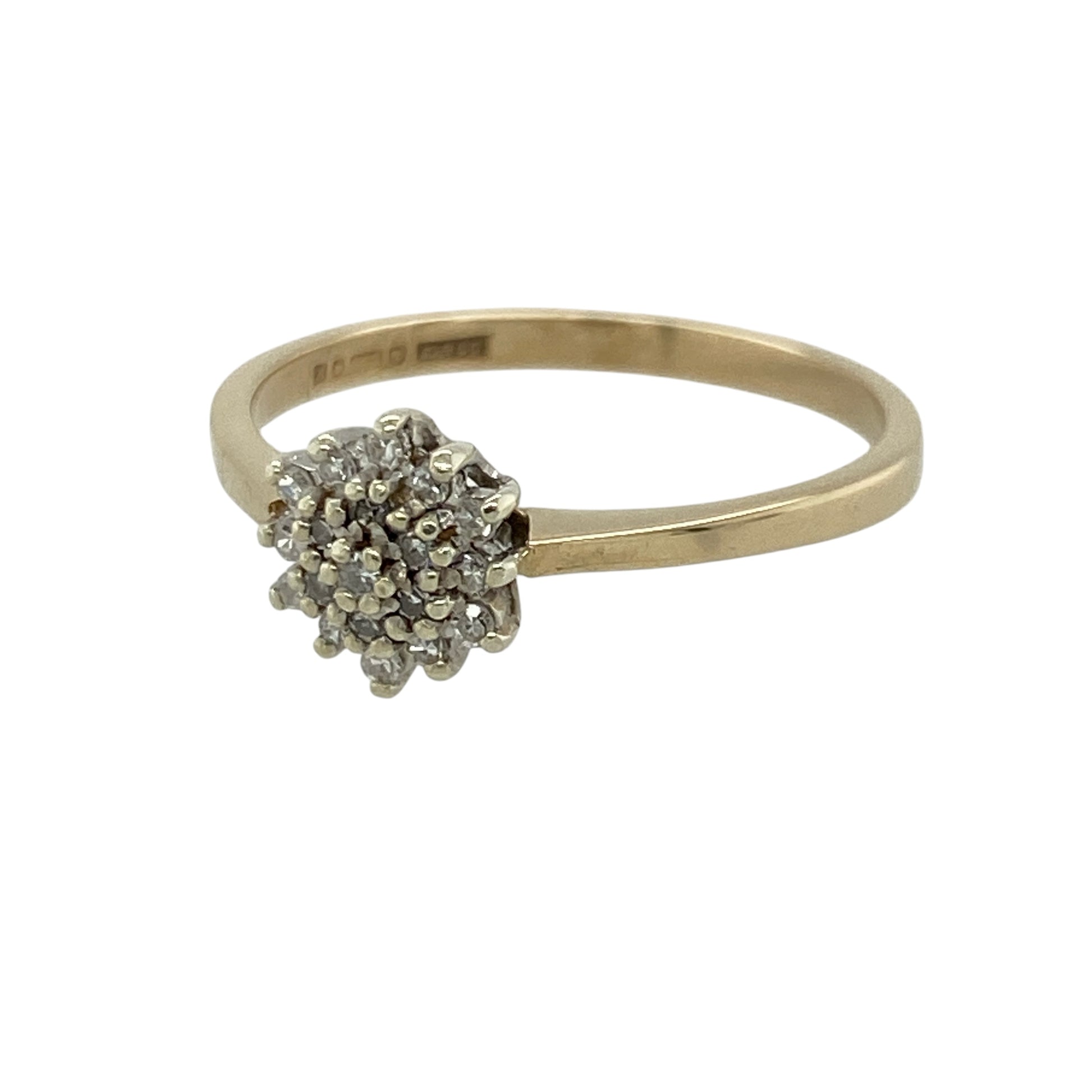 Add classic sparkle and timeless elegance to your jewellery collection with this pre-owned 9ct yellow gold and diamond cluster ring, featuring a traditional round diamond arrangement and refined brilliance—perfect as a dress ring, anniversary gift, special occasion piece, or elegant addition to your everyday jewellery collection.

Design: The ring features a classic round cluster design, with sparkling diamonds arranged to create an eye-catching focal point and a timeless appearance