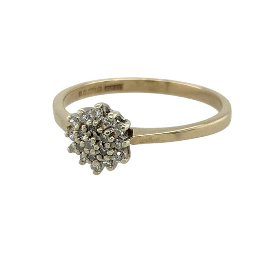 Add classic sparkle and timeless elegance to your jewellery collection with this pre-owned 9ct yellow gold and diamond cluster ring, featuring a traditional round diamond arrangement and refined brilliance—perfect as a dress ring, anniversary gift, special occasion piece, or elegant addition to your everyday jewellery collection.

Design: The ring features a classic round cluster design, with sparkling diamonds arranged to create an eye-catching focal point and a timeless appearance