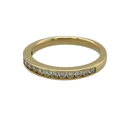 Add timeless sparkle and refined luxury to your jewellery collection with this pre-owned 18ct yellow gold and diamond band ring, featuring a sleek profile and approximately 0.30ct of total diamond content—perfect as a diamond wedding band, anniversary ring, stacking ring, or elegant piece for everyday wear and special occasions.

Design: The ring features a classic diamond band design with sparkling diamonds arranged across the front, creating an elegant and versatile appearance