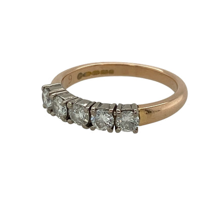 Add romantic warmth and impressive sparkle to your jewellery collection with this pre-owned 18ct rose gold and diamond five stone band ring, featuring five brilliant-cut diamonds with approximately 0.50ct of total diamond content—perfect as an anniversary ring, wedding band, eternity-style ring, or luxurious piece of fine jewellery.

Design: The ring features a classic five stone band design with five brilliant-cut diamonds arranged across the front, creating an elegant display of sparkle