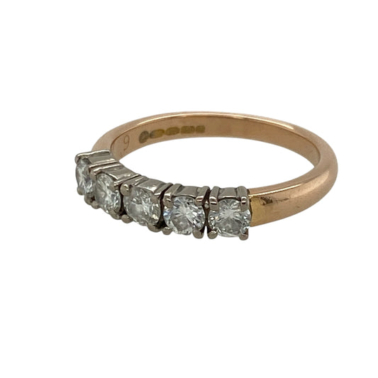 Add romantic warmth and impressive sparkle to your jewellery collection with this pre-owned 18ct rose gold and diamond five stone band ring, featuring five brilliant-cut diamonds with approximately 0.50ct of total diamond content—perfect as an anniversary ring, wedding band, eternity-style ring, or luxurious piece of fine jewellery.

Design: The ring features a classic five stone band design with five brilliant-cut diamonds arranged across the front, creating an elegant display of sparkle