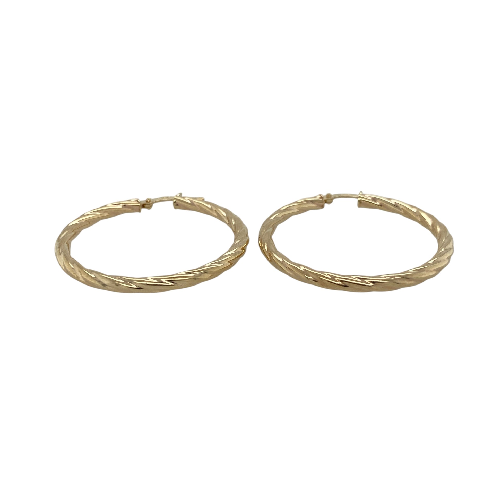 Add timeless style and elegant detail to your jewellery collection with these pre-owned 9ct yellow gold twisted hoop Creole earrings, featuring a classic twisted design that brings texture and sophistication to any look—perfect for everyday wear, special occasions, or completing your favourite jewellery collection.

Design: The earrings feature a classic Creole hoop design with an elegant twisted finish, creating a timeless look with added texture and visual interest.