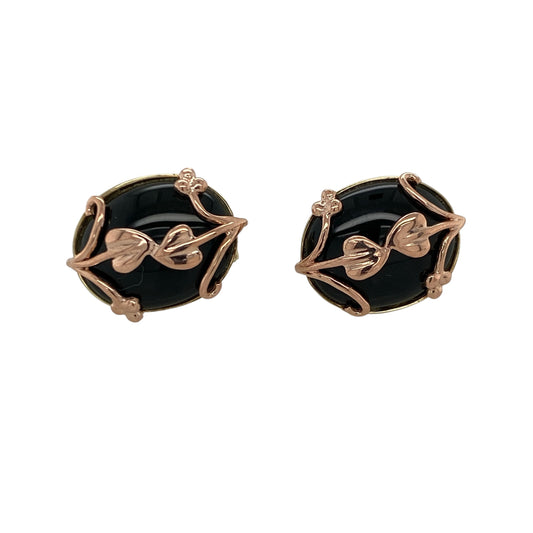 Add iconic Welsh design and timeless elegance to your jewellery collection with these pre-owned 9ct yellow gold and onyx Clogau Tree of Life 'Nightfall' earrings, featuring striking onyx gemstones and the signature Tree of Life motif—perfect for special occasions or adding a distinctive touch to your everyday jewellery.

Design: The earrings feature the elegant Clogau Tree of Life 'Nightfall' design, showcasing beautifully polished oval onyx stones accented with the iconic Tree of Life motif
