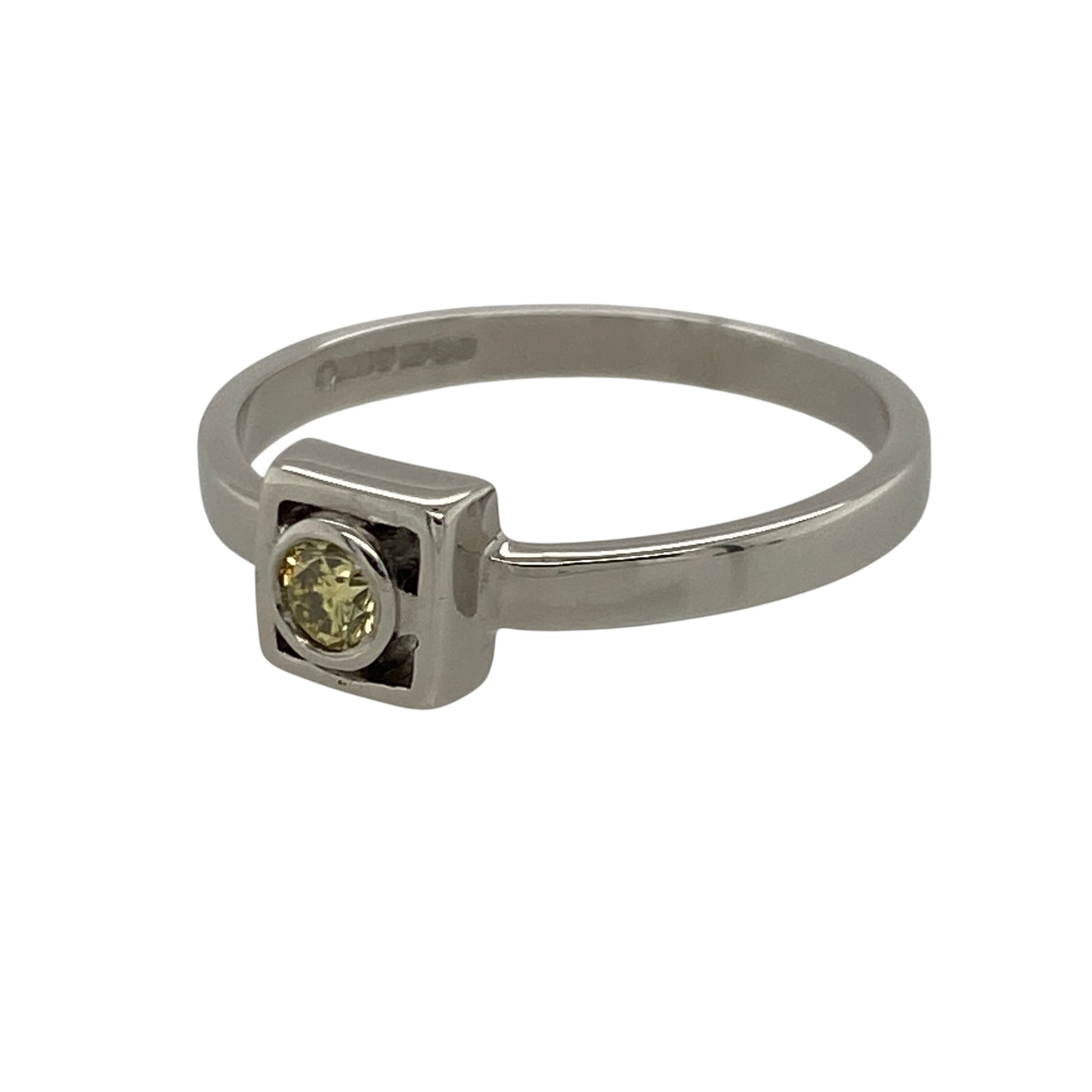 Add exceptional elegance and rare colour to your jewellery collection with this pre-owned 18ct white gold yellow diamond solitaire ring, featuring a brilliant-cut natural yellow diamond in a contemporary square setting—perfect as an engagement ring, anniversary gift, or luxurious statement piece.

Design: The ring showcases a brilliant-cut yellow diamond in a striking square setting, creating a contemporary solitaire design that beautifully highlights the rare colour and sparkle of the centre stone.