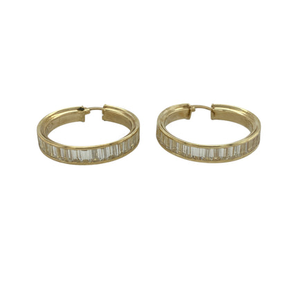 Add eye-catching sparkle to your jewellery collection with these pre-owned 9ct yellow gold and cubic zirconia round creole earrings. Combining the timeless appeal of classic hoops with the brilliance of cubic zirconia, they are perfect for both everyday elegance and special occasions.

Design: The earrings feature a classic round creole design, beautifully accented with sparkling cubic zirconia stones that catch the light from every angle.