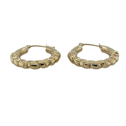 Enhance your jewellery collection with these pre-owned 9ct yellow gold twisted hoop creole earrings. Their elegant twisted design adds texture and sparkle to a timeless hoop style, making them perfect for both everyday wear and special occasions.

Design: The earrings feature a classic creole hoop design with an attractive twisted finish that catches the light beautifully, adding subtle detail and dimension.