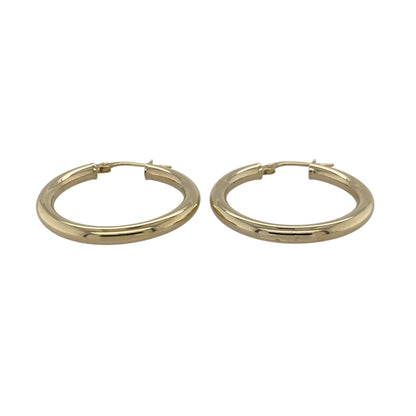 Complete your jewellery collection with these pre-owned 9ct yellow gold plain hoop creole earrings. Their classic polished design offers timeless elegance, making them a versatile accessory for everyday wear or special occasions.

Design: The earrings feature a traditional plain hoop creole design with a smooth polished finish, creating a clean and sophisticated look that never goes out of style.