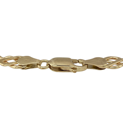 Celebrate timeless Celtic style with this pre-owned 9ct yellow gold Celtic link bracelet. Featuring beautifully detailed interlocking Celtic-inspired links, this elegant bracelet is perfect for everyday wear or as a meaningful gift.

Design: The bracelet showcases a classic Celtic link design with intricately shaped interlocking links, creating a distinctive look that blends heritage with timeless elegance.