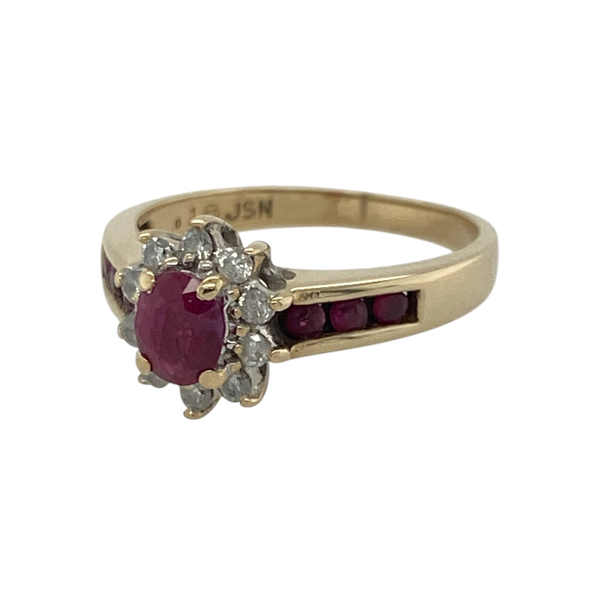 Add a touch of timeless colour to your jewellery collection with this pre-owned 9ct yellow gold diamond and ruby cluster ring. Featuring a vibrant oval ruby surrounded by sparkling diamonds, with additional rubies set into the shoulders, this elegant ring makes a beautiful statement for everyday wear or special occasions.

Design: The ring showcases an oval ruby at its centre, framed by a sparkling diamond cluster, while ruby-set shoulders add extra colour and sophistication to the classic design.