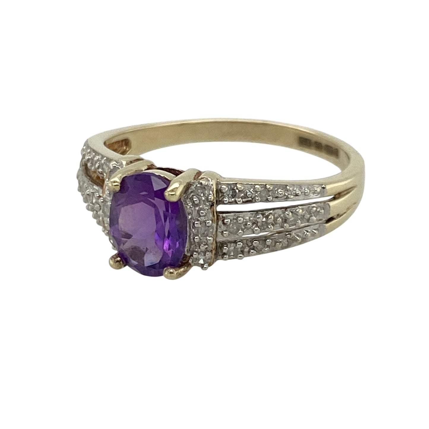 Make a statement with this pre-owned 9ct yellow gold diamond and amethyst ring. Featuring a striking oval amethyst complemented by sparkling three-row diamond set shoulders, this elegant ring is perfect for adding a touch of colour and sophistication to any jewellery collection.

Design: The ring showcases a beautiful oval amethyst at its centre, with three rows of sparkling diamonds set into each shoulder, creating an eye-catching and elegant design.