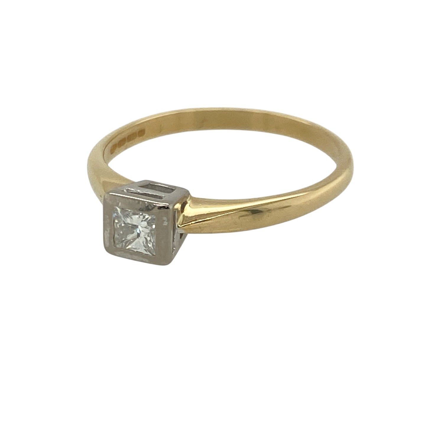 Celebrate timeless elegance with this pre-owned 18ct yellow gold diamond solitaire ring. Featuring a stunning princess cut diamond in a classic setting, this ring is a beautiful choice for an engagement, anniversary or everyday luxury.

Design: The ring showcases a single princess cut diamond in a timeless solitaire design, allowing the diamond to take centre stage with its clean, elegant lines.