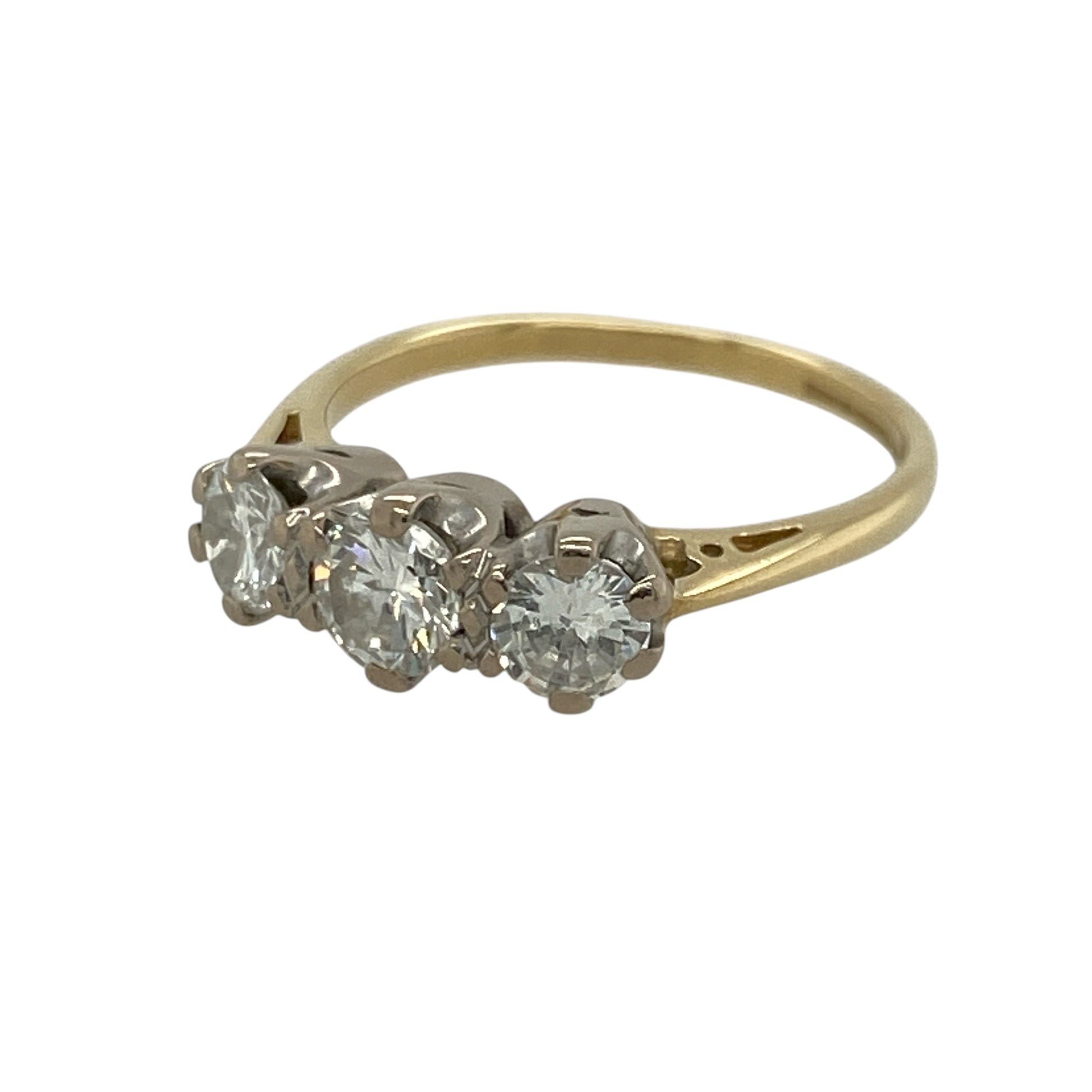 Celebrate life's special moments with this pre-owned 18ct yellow gold diamond trilogy ring. Set with three sparkling diamonds symbolising your past, present and future, this timeless design makes a meaningful gift or elegant engagement ring.

Design: The ring features a classic trilogy setting with three brilliant diamonds arranged across the front, creating a timeless and sophisticated look.
Material: Made from 18-carat yellow gold, the rich golden band beautifully complements the sparkle of the diamonds.