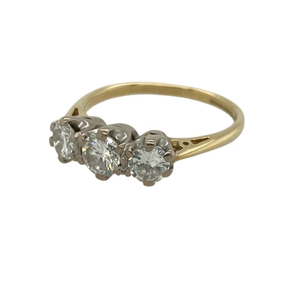 Celebrate life's special moments with this pre-owned 18ct yellow gold diamond trilogy ring. Set with three sparkling diamonds symbolising your past, present and future, this timeless design makes a meaningful gift or elegant engagement ring.

Design: The ring features a classic trilogy setting with three brilliant diamonds arranged across the front, creating a timeless and sophisticated look.
Material: Made from 18-carat yellow gold, the rich golden band beautifully complements the sparkle of the diamonds.