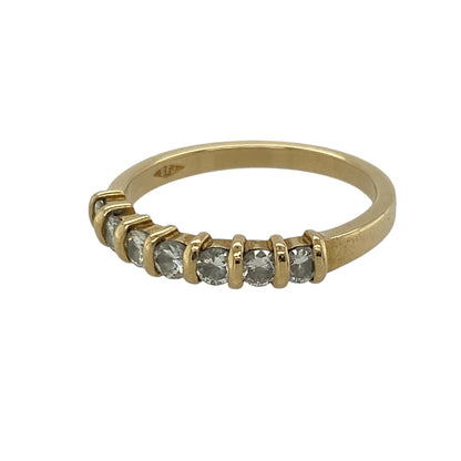 A timeless symbol of elegance, this pre-owned 18ct yellow gold diamond seven stone band ring is designed to sparkle from every angle. Set with seven dazzling diamonds, it makes a beautiful choice for an anniversary, wedding band, or everyday luxury.

Design: The ring features a classic seven stone band design, with the diamonds set in a neat row across the front to create a sophisticated and enduring style.