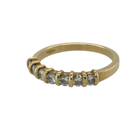 A timeless symbol of elegance, this pre-owned 18ct yellow gold diamond seven stone band ring is designed to sparkle from every angle. Set with seven dazzling diamonds, it makes a beautiful choice for an anniversary, wedding band, or everyday luxury.

Design: The ring features a classic seven stone band design, with the diamonds set in a neat row across the front to create a sophisticated and enduring style.