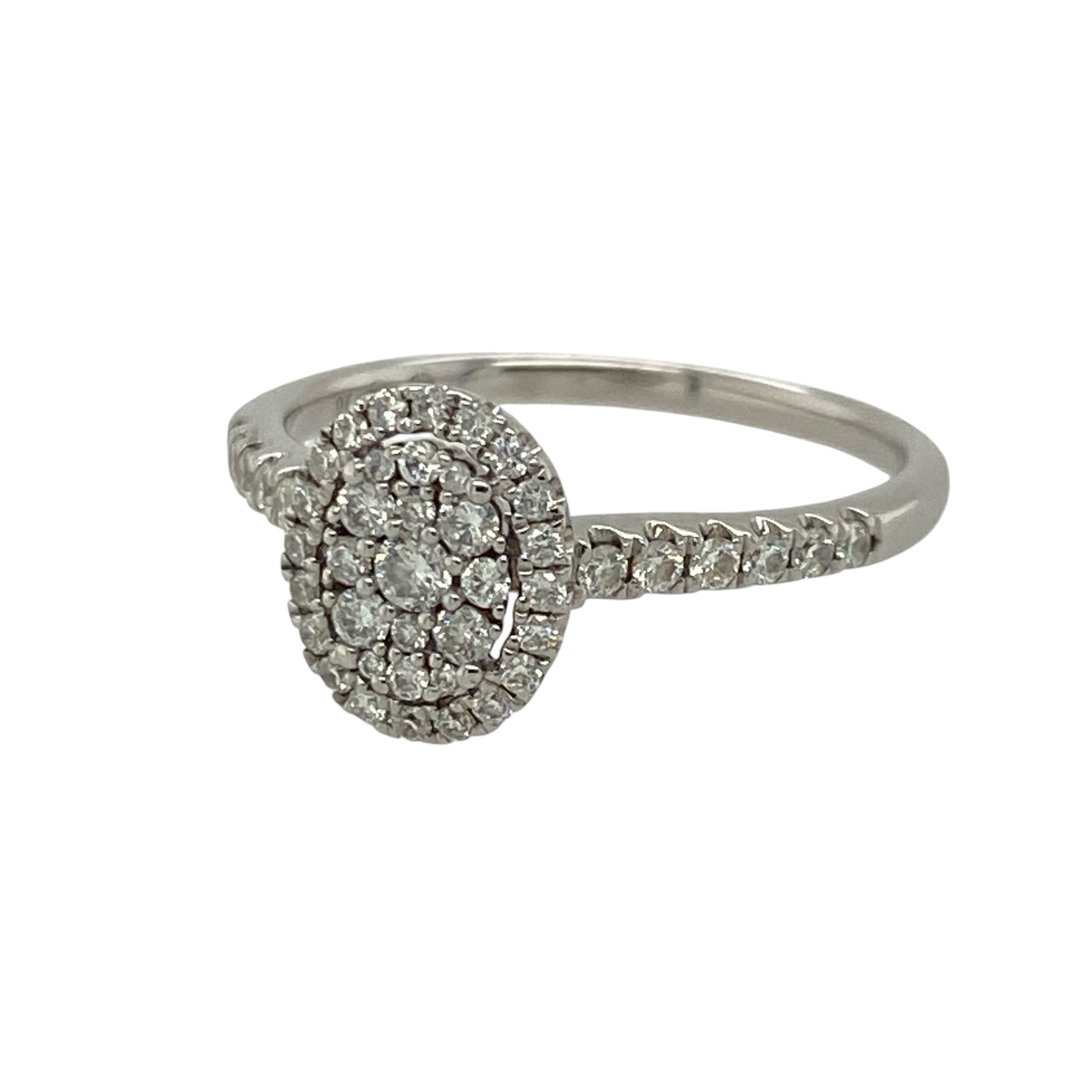 Add timeless elegance to your jewellery collection with this pre-owned 9ct white gold diamond oval cluster ring. Featuring a sparkling oval cluster of diamonds, this eye-catching design offers exceptional brilliance and classic style.

Design: The ring showcases an elegant oval diamond cluster measuring approximately 10mm high, creating a striking look with plenty of sparkle.